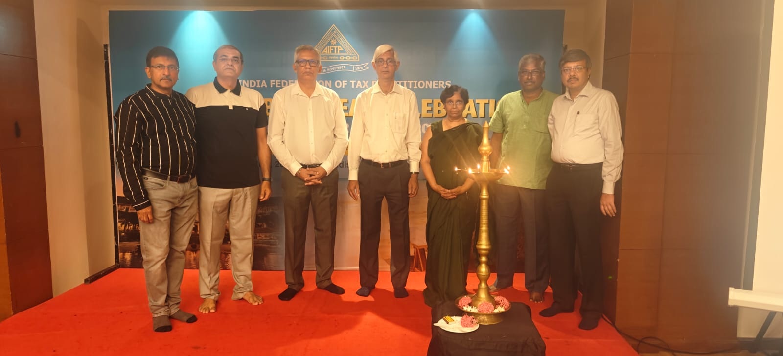 Inaugural Session: From Left to Right S/Shri Deepak R. Shah, Chairman, Conference Committee, Bharat Sachdev, National Vice President, AIFTP (WZ), Sanjay Kumar, Deputy President, AIFTP, S. Venkataramani, National President, AIFTP, Smt. Anagha Kulkarni, NEC Member, AIFTP, G. Baskar, Secretary General, AIFTP and Vivek Agarwal, Co-Chairman, Golden Jubilee Year Celebration Committee, AIFTP.